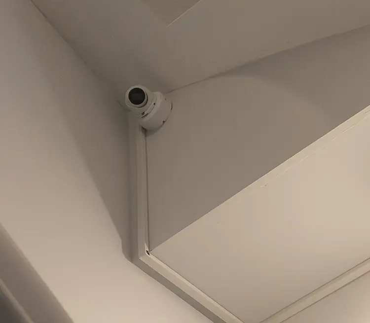 CCTV dome camera installed in corner of hallway ceiling in Dulwich SE22
