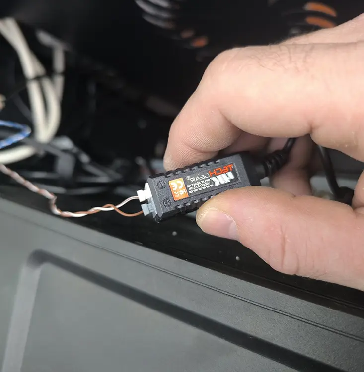 CCTV engineer connecting 4K HD video balun to DVR unit during installation in Wallington SM6, London Borough of Sutton