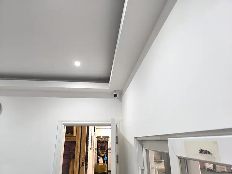 Dome CCTV camera installed on high ceiling corner of commercial premises in West Norwood SE27