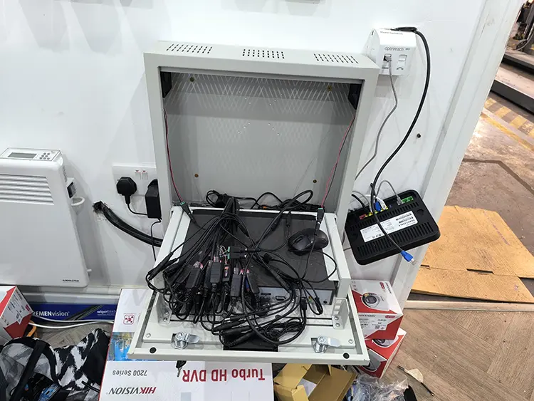 Hikvision Turbo HD DVR installed in wall cabinet at commercial property in West Norwood SE27