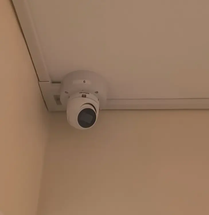 Dome CCTV camera mounted on ceiling corner in Battersea SW11 — professional installation by CCTVcam