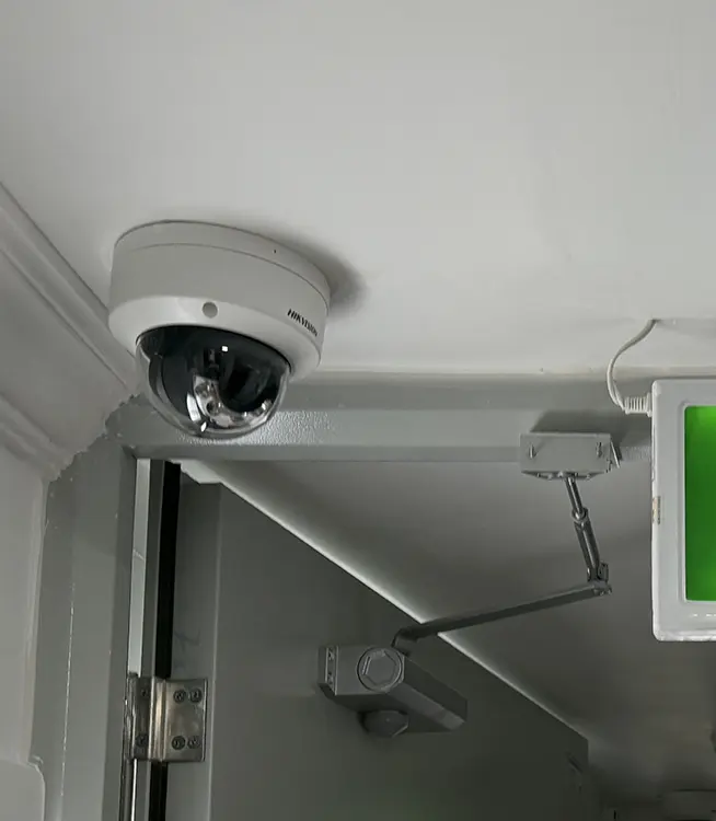 Hikvision dome CCTV camera installed on ceiling in commercial property in Surbiton KT6