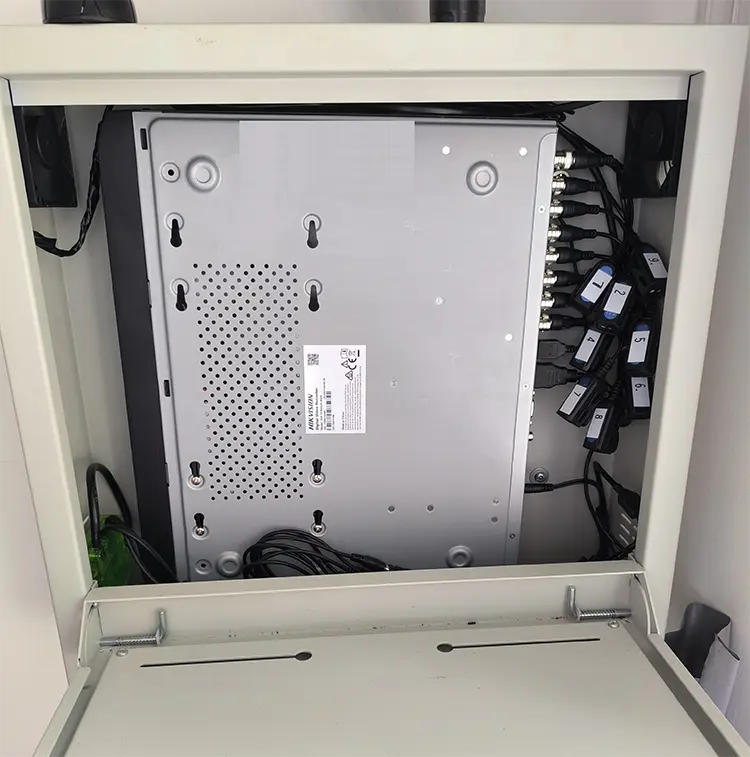 Hikvision 8-channel DVR installed inside security cabinet at commercial property in Dulwich SE22