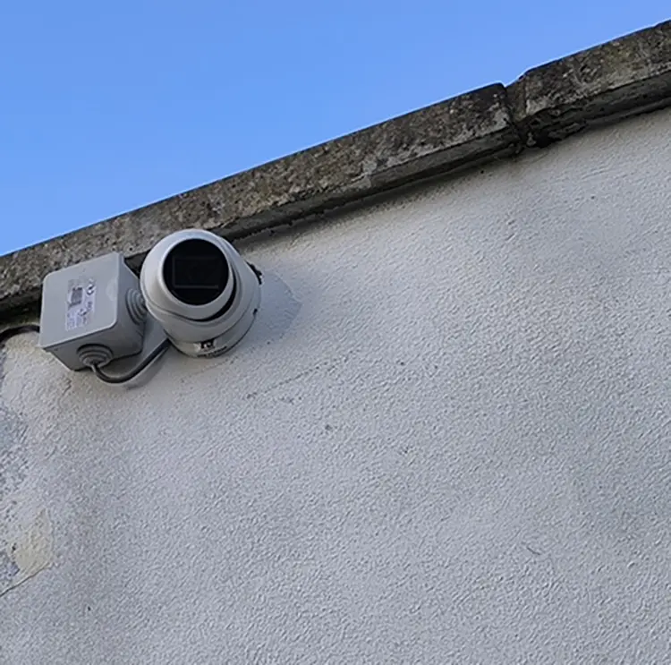 Outdoor CCTV dome camera mounted on exterior wall of residential property in Earlsfield SW18
