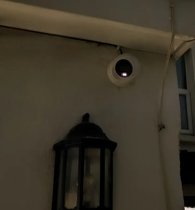 Outdoor dome CCTV camera with night vision installed on house exterior in Whitton TW2, Richmond — home security installation by cctvcam.co.uk